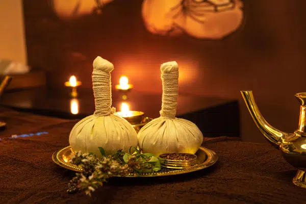 Herbal poultices used in traditional Ayurvedic treatment at an Ayurveda clinic