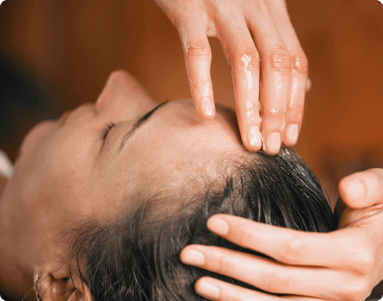 Ayurvedic head massage supporting relaxation and stress management