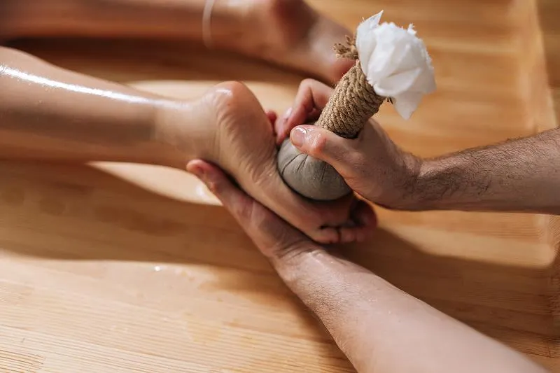 Traditional Kizhi therapy performed as part of Ayurvedic treatment